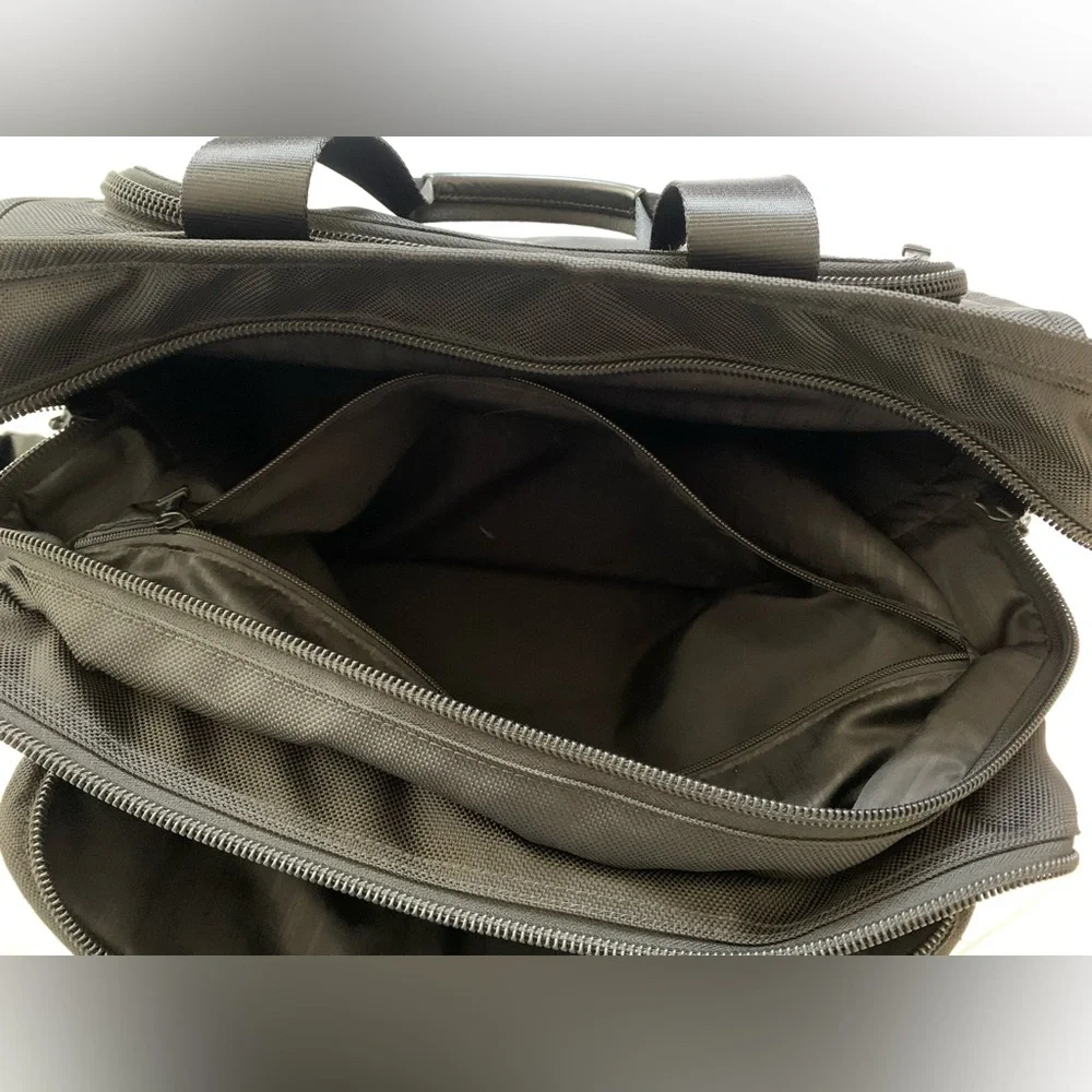 Tumi Black Travel Bag with Adjustable Strap